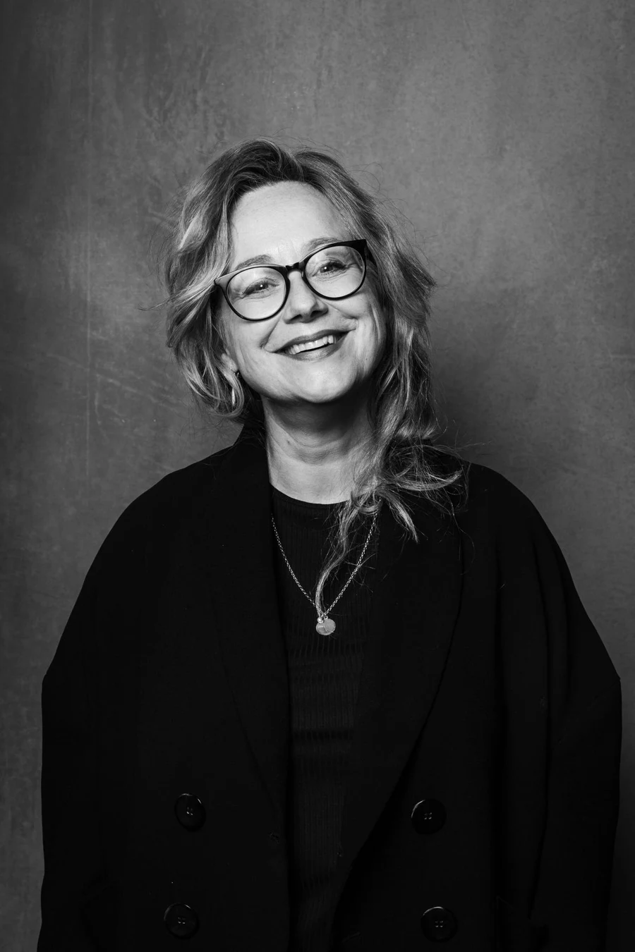 Black-and-white portrait of Astrid Bussink.
